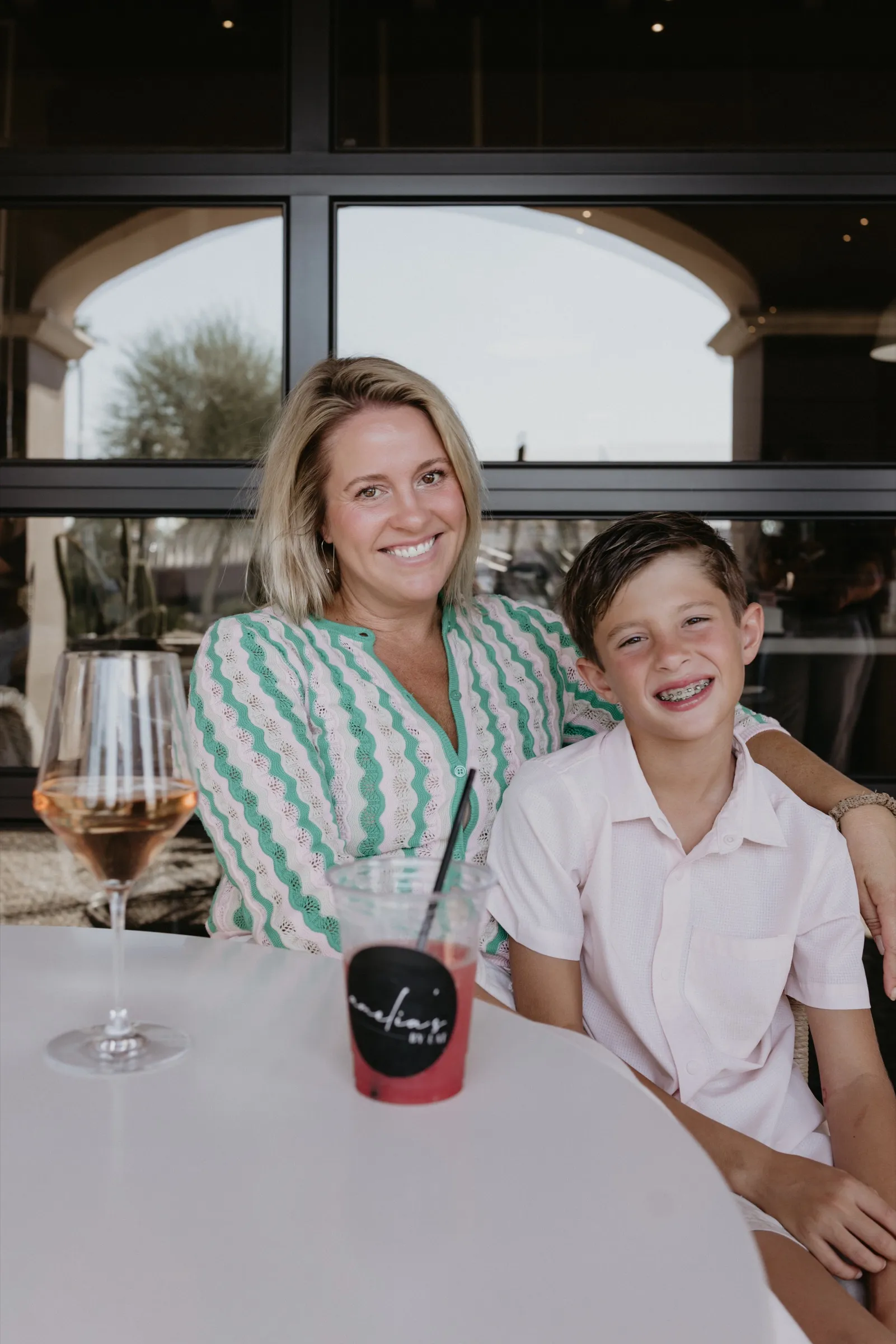 Stacey Weber and her son Jack sitting together at a patio table at Amelia's by EAT in Scottsdale